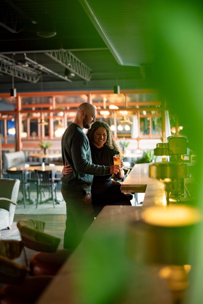 couples cheersing at a cocktail bar