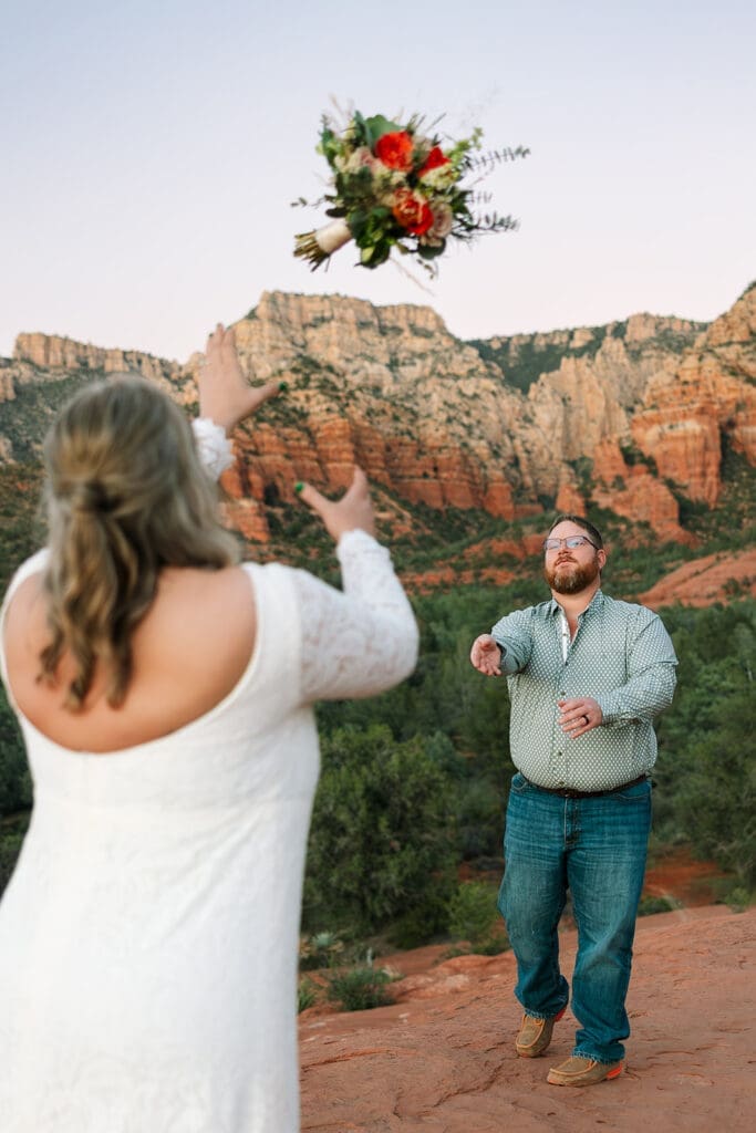 Elopement bride getting ready with bouquet in Sedona